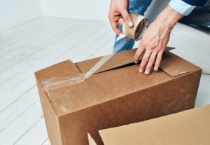 boxes with things office worker professional place work
