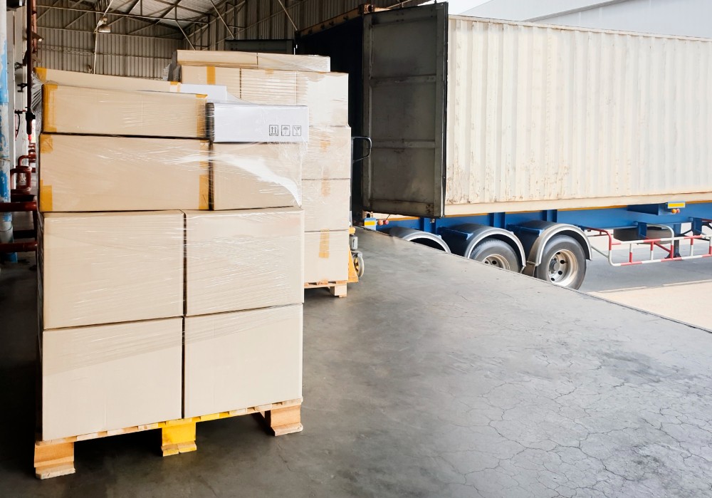 stack shipment boxes pallet waiting load into container truck road freight shipment transport by truck